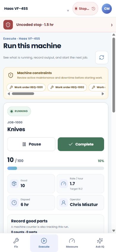 The phone-sized operator workspace for a running job, showing maintenance constraints, job progress, good quantity, rate, elapsed time, and the controls to pause or complete the run.